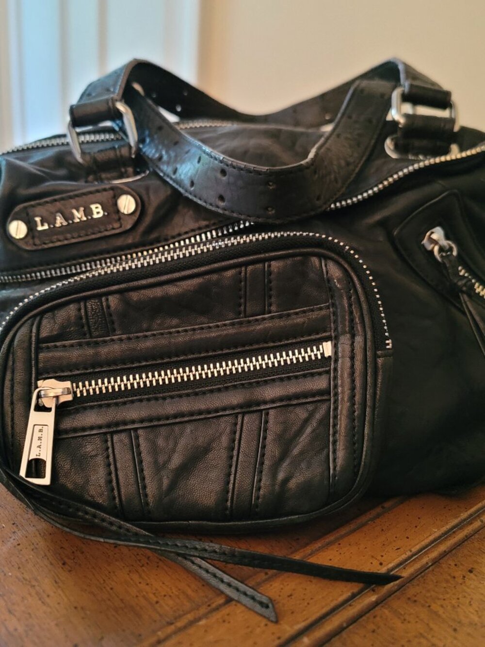 L.A.M.B. Gwen Stefani black handbag